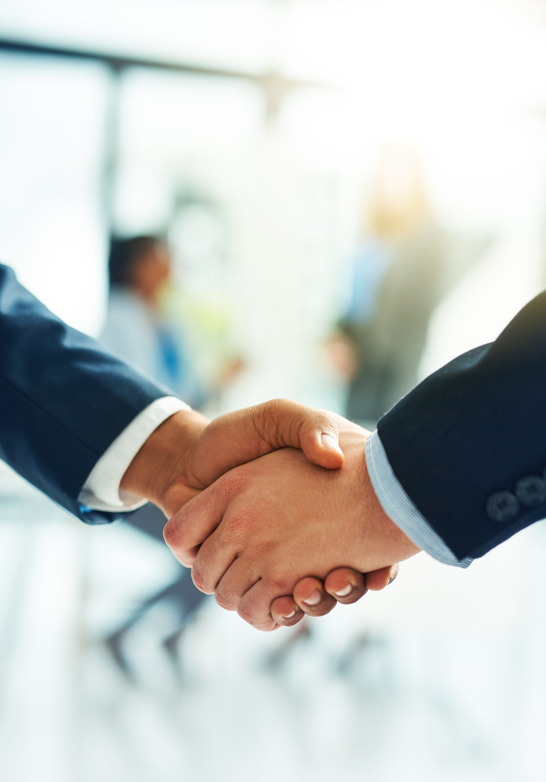 Partnerships in progress. Closeup shot of businesspeople shaking hands.